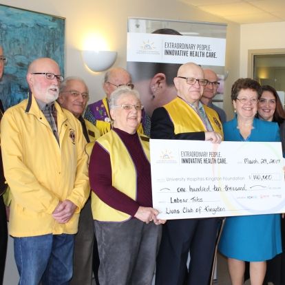 Members of the Lions Club present UHKF President &amp; CEO Denise Cumming with their $110,000 donation to KHSC