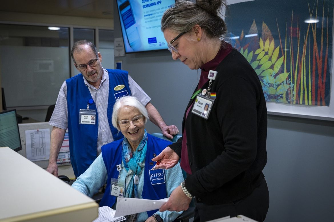 Volunteers working in department.