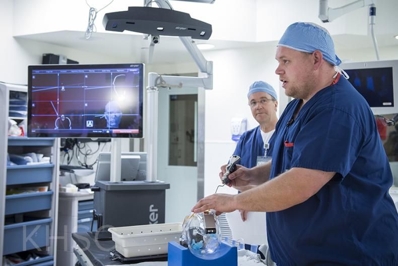 Dr. D.J. Cook, a neurosurgeon at KHSC demonstrates how the neuronavigation system works.