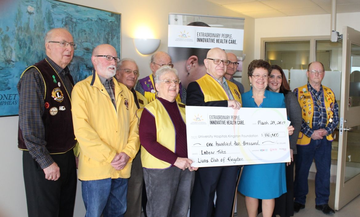Members of the Lions Club present UHKF President &amp; CEO Denise Cumming with their $110,000 donation to KHSC