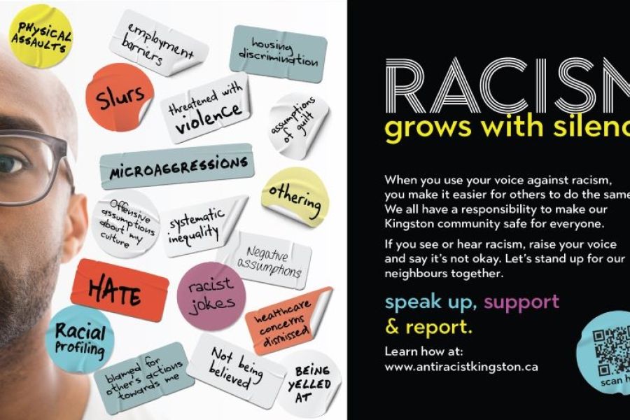 Man with glasses and antiracism messaging