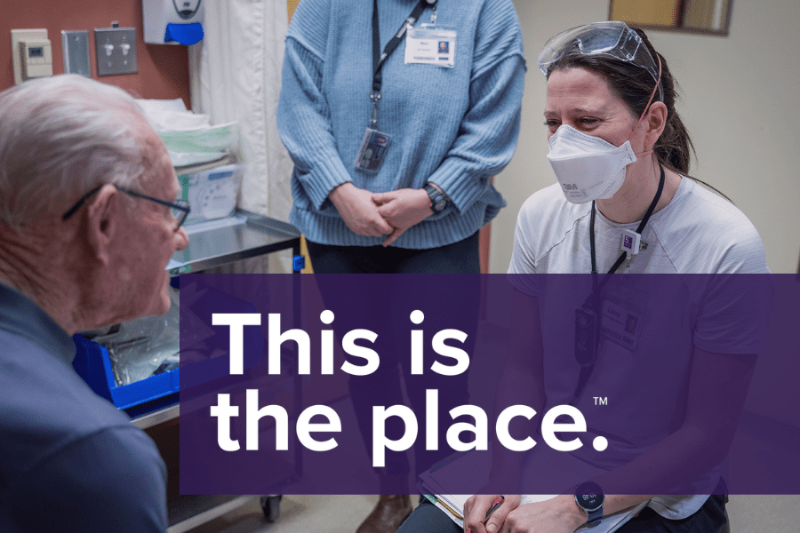A speech language pathologists speaks with a patient.
