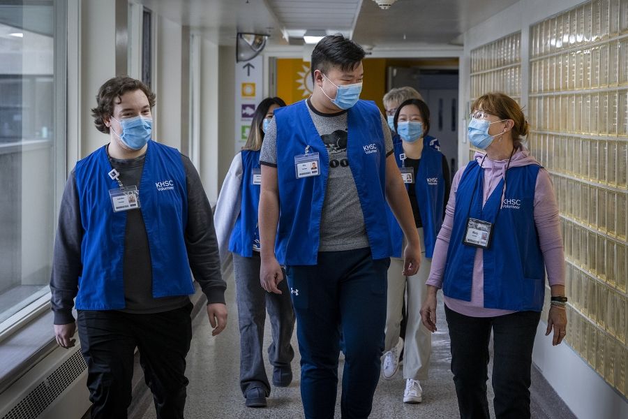 Volunteers walk the hallway at the KGH site