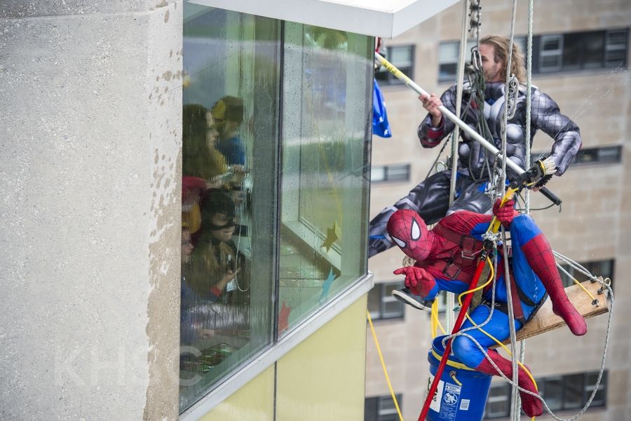 heroes clean windows at KGH site