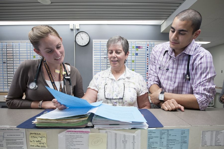 Elder Life Nurse Specialist Kathy Kittner talks about options with residents on Connell 9 to make sure they are aware of Advanced Care Planning.
