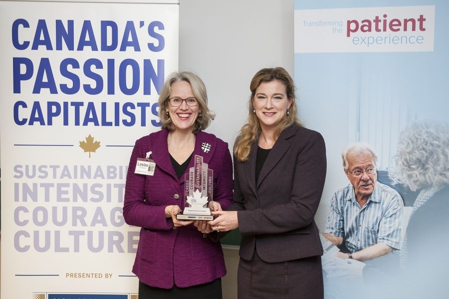 KGH President &amp; CEO Leslee Thompson receives KGH's Passion Capital Award from Leslie Carter, Chief Brand &amp; Strategy Officer at Knightsbridge Human Capital Solutions on December 1, 2014.