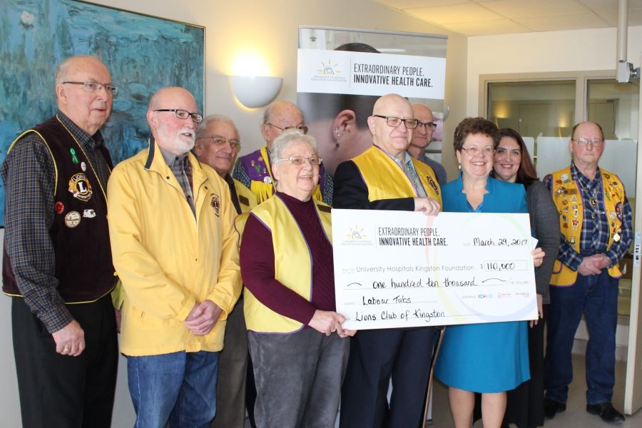 Members of the Lions Club present UHKF President &amp; CEO Denise Cumming with their $110,000 donation to KHSC
