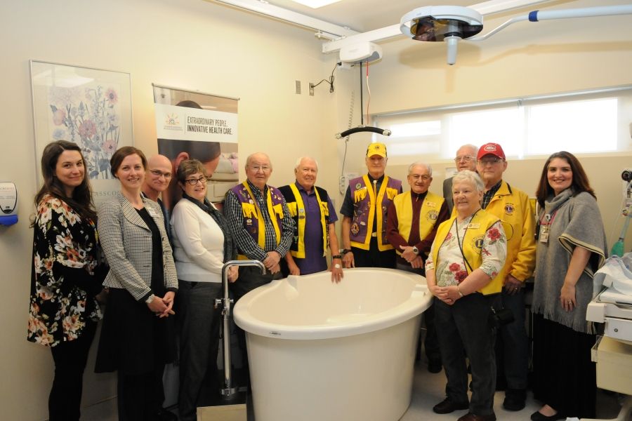 Members of the Lions Club and KHSC's labour and delivery team unveil the new tubs